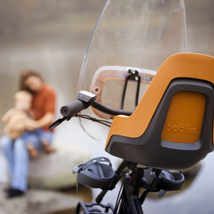 Silla delantera de bicicleta con pantalla de protección